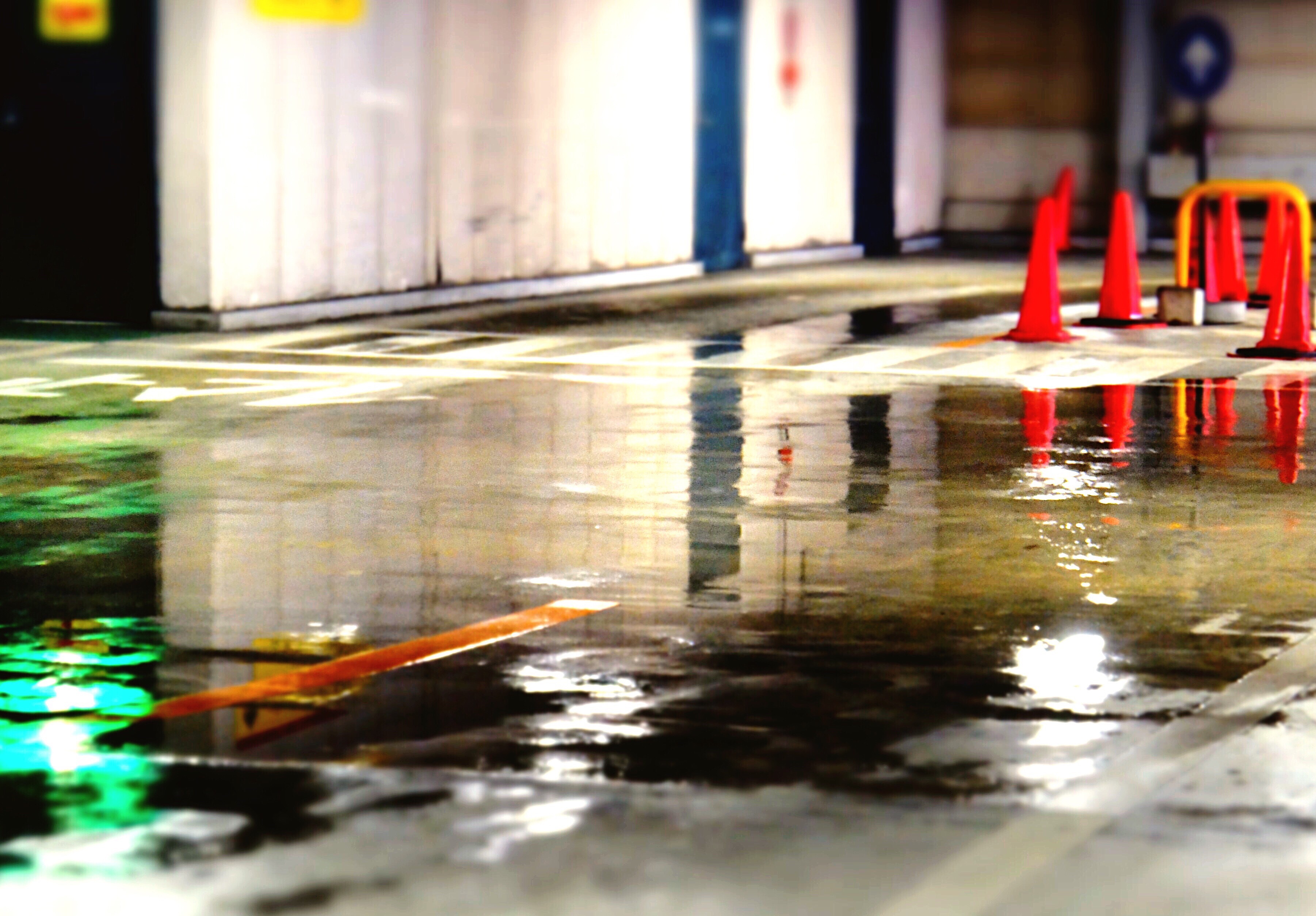 Flooded water reflection on the ground of parking lot 2023 11 27 05 06 18 utc

